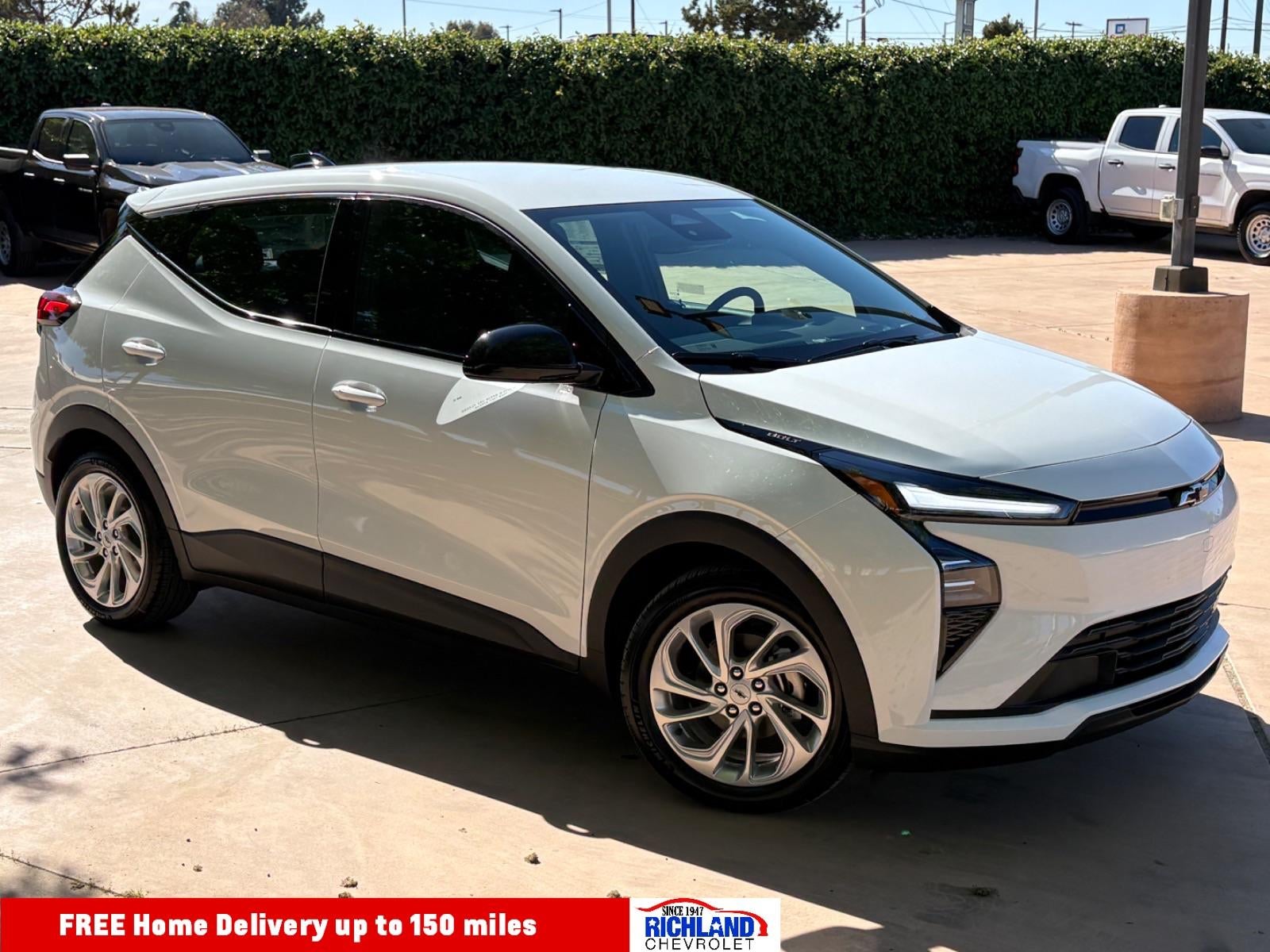 2027 Chevrolet Bolt LT in Summit White — front three-quarter view
