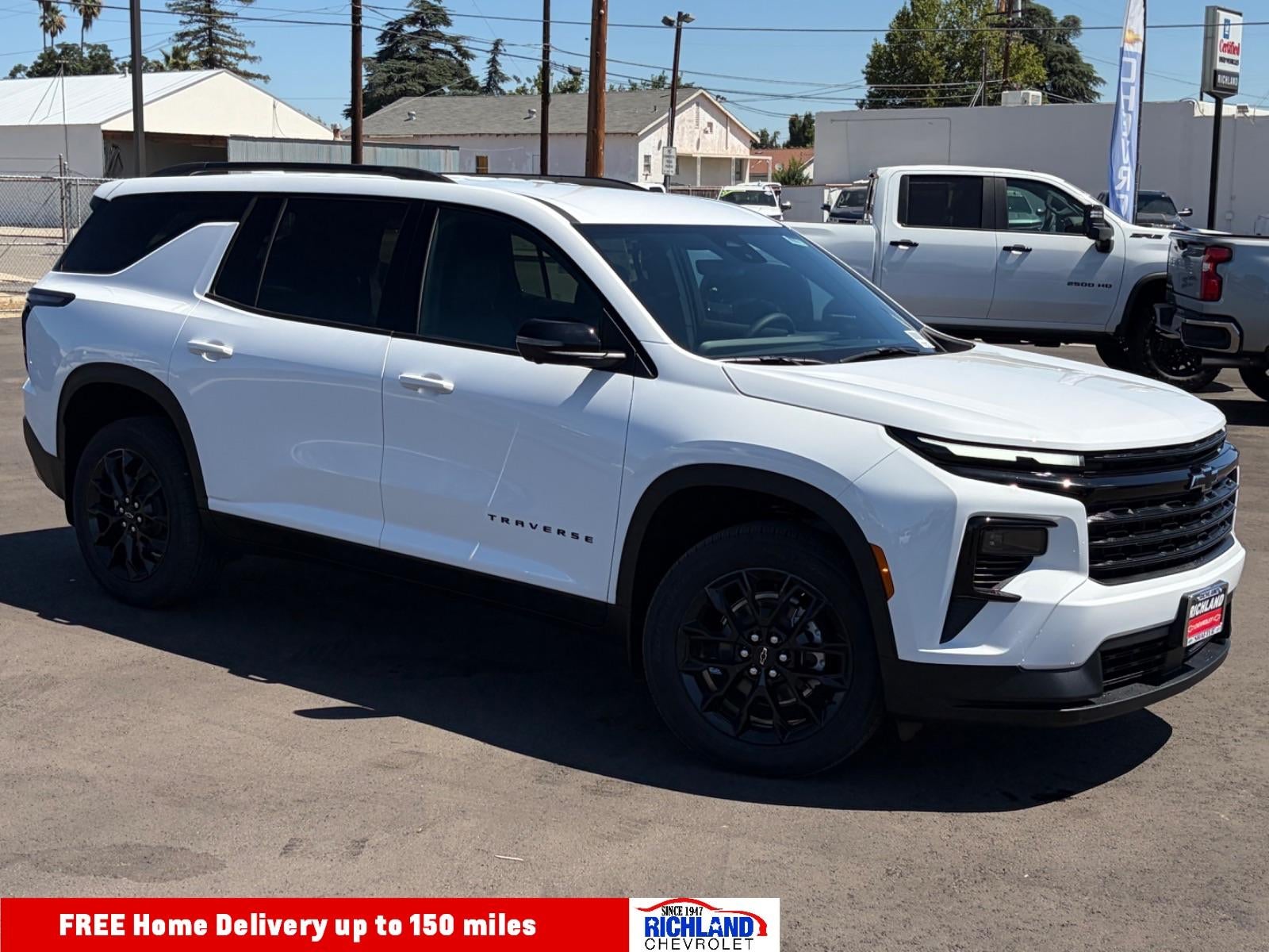 2026 Chevrolet Traverse LT in Summit White — front three-quarter view