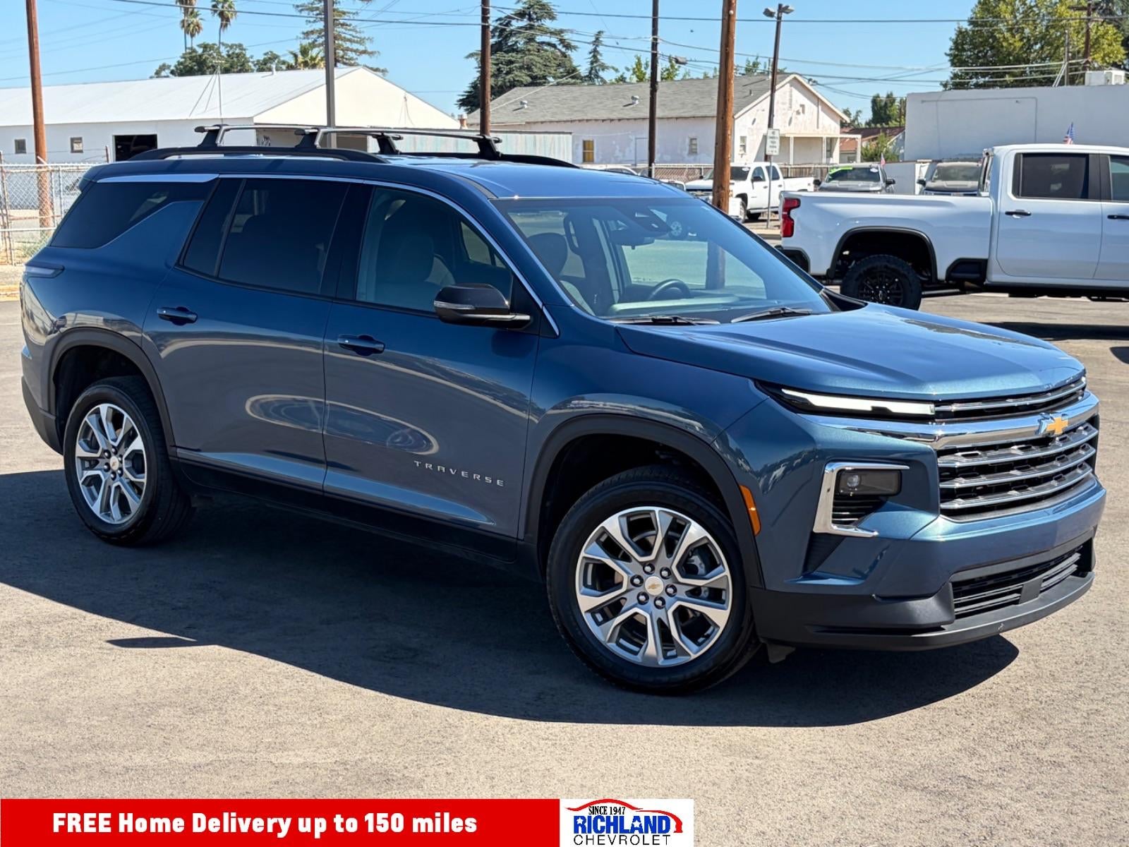 2025 Chevrolet Traverse LT in Lakeshore Blue Metallic — front three-quarter view