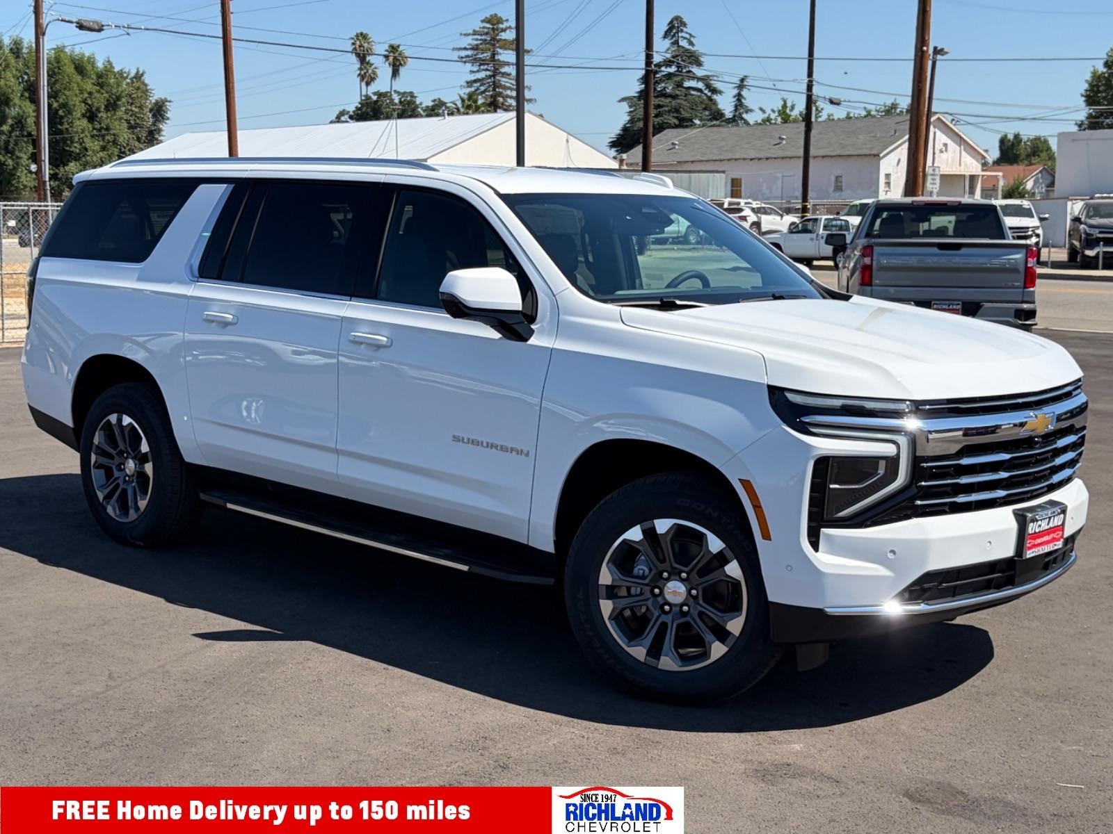2026 Chevrolet Suburban LT in Summit White — front three-quarter view