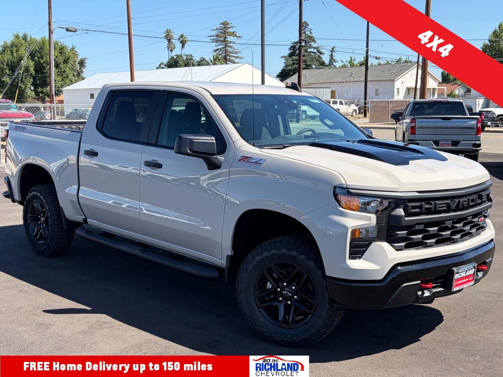 2026 Chevrolet Silverado 1500 Custom Trail Boss in White Sands — front three-quarter view